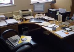 an untidy office desk